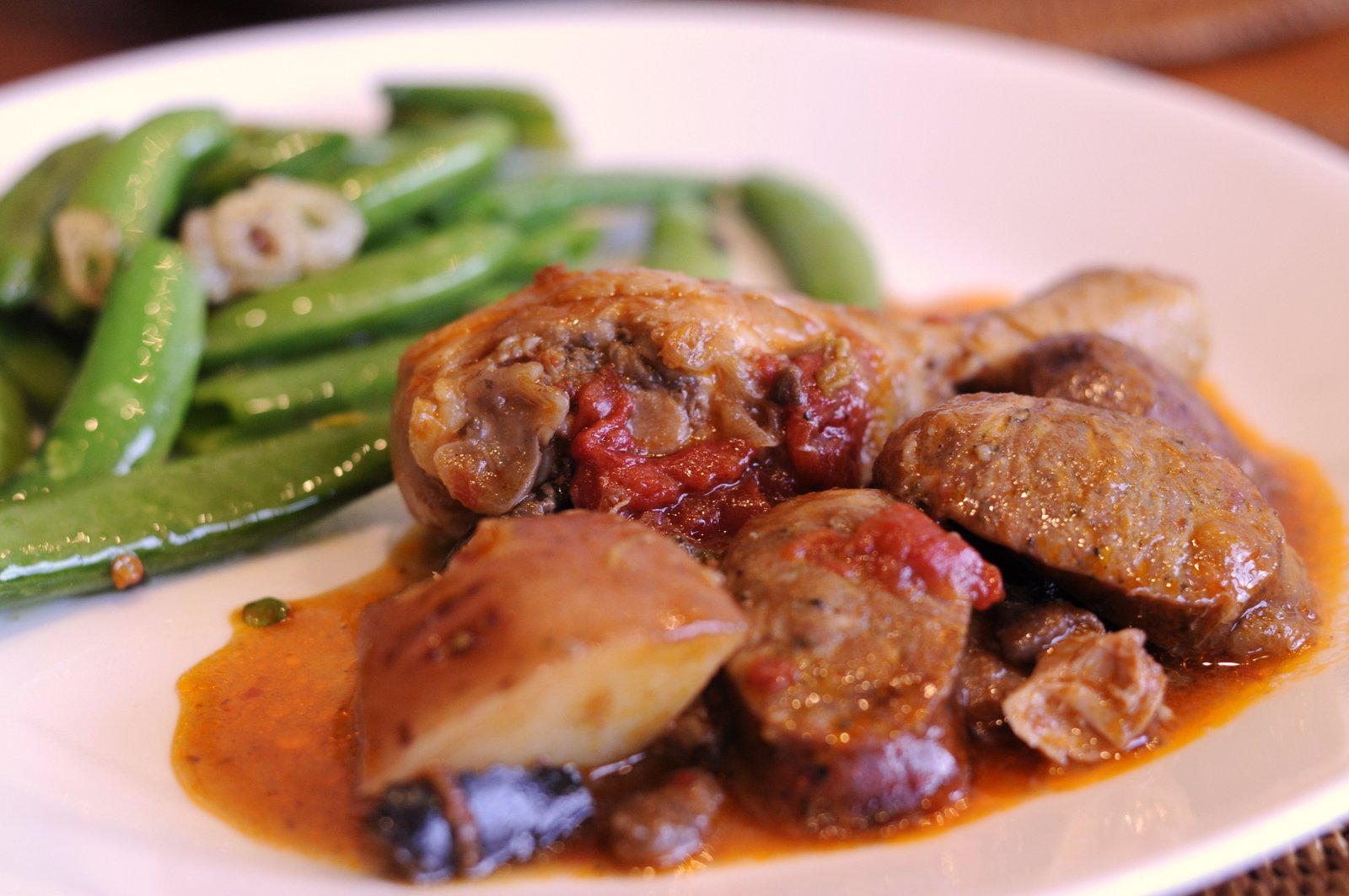 Dinner tonight Chicken and andouille sausage stew, garlic snap peas