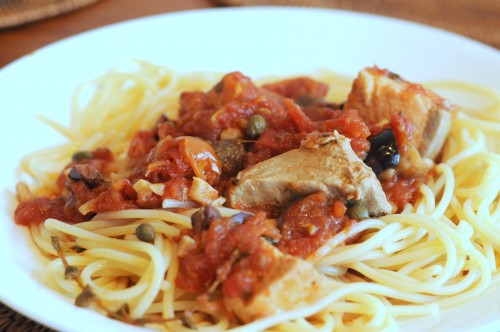 Tuna and salmon cubes in tomato, capers, mushrooms, olives and fresh oregano over pasta.