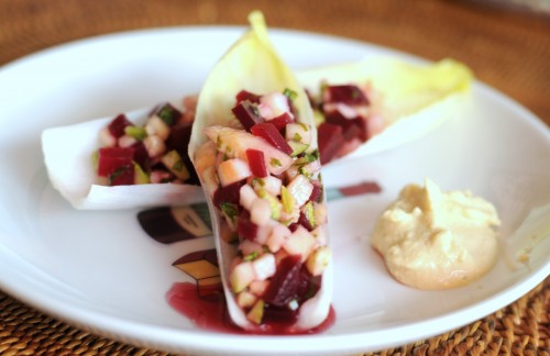 Afternoon snack: Zuchini, arugula, and beet salad on endive with a side of hummus. Drool.